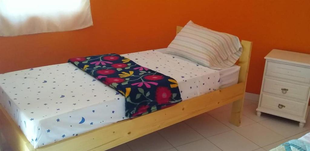 Postel nebo postele na pokoji v ubytování Casa helena
