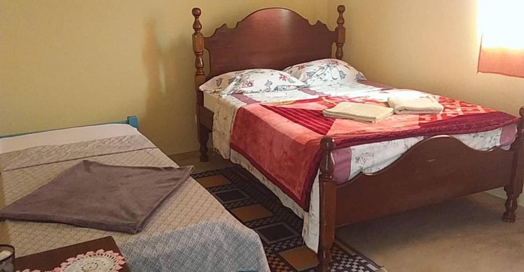 Postel nebo postele na pokoji v ubytování Casa helena