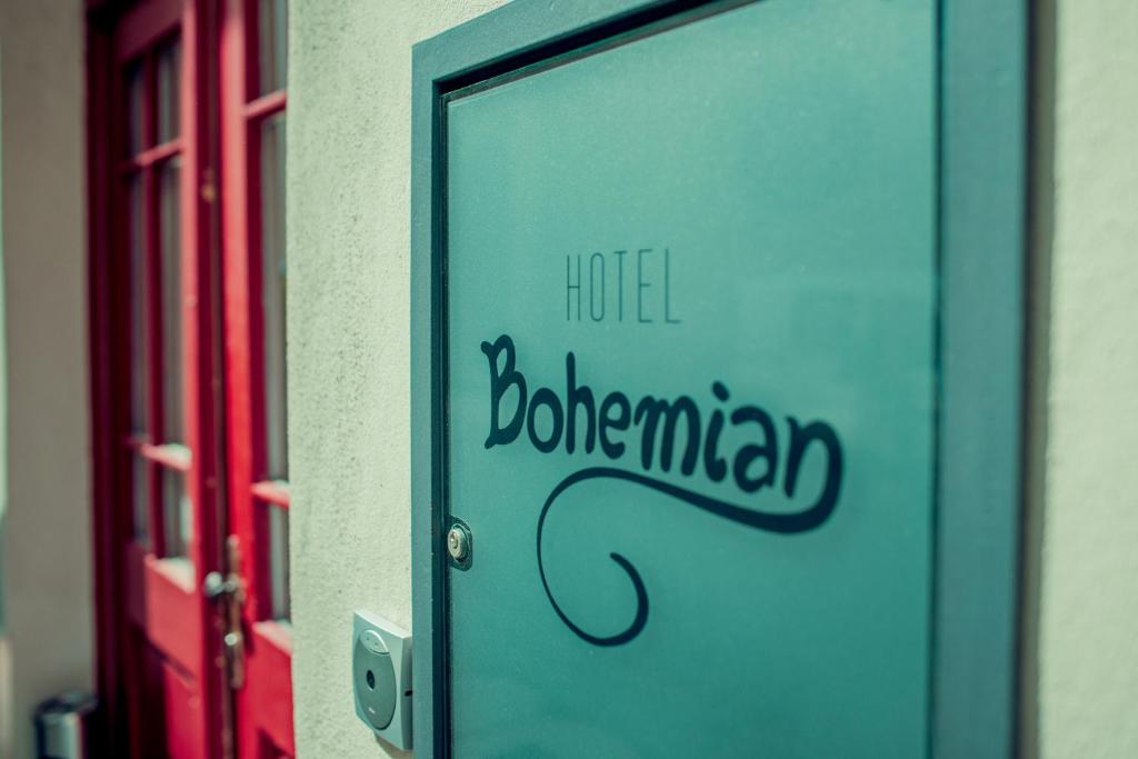 a door with the words hotel bohemian written on it at Bohemian Hotel in Regensburg