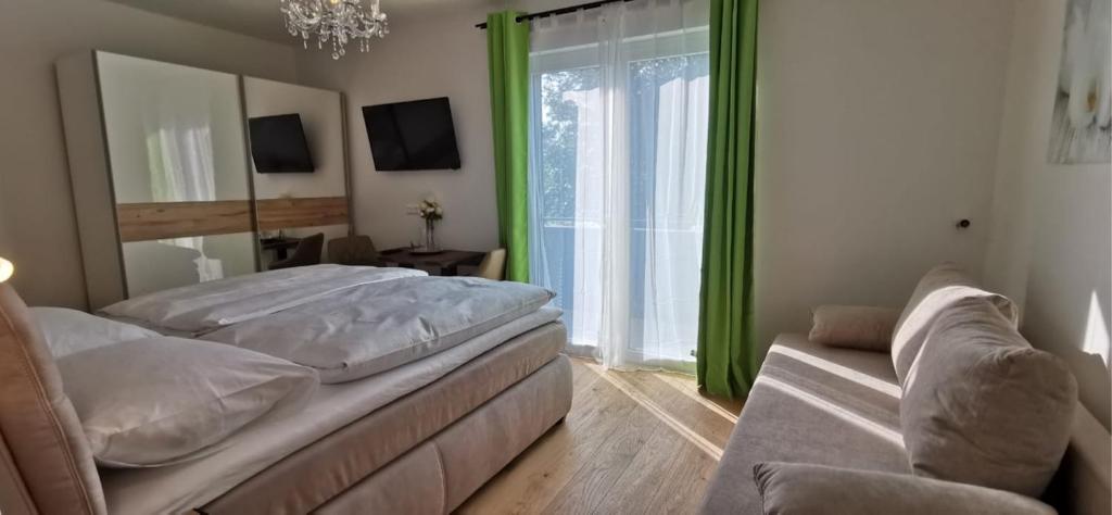 Posteľ alebo postele v izbe v ubytovaní Enjoyit Velden West