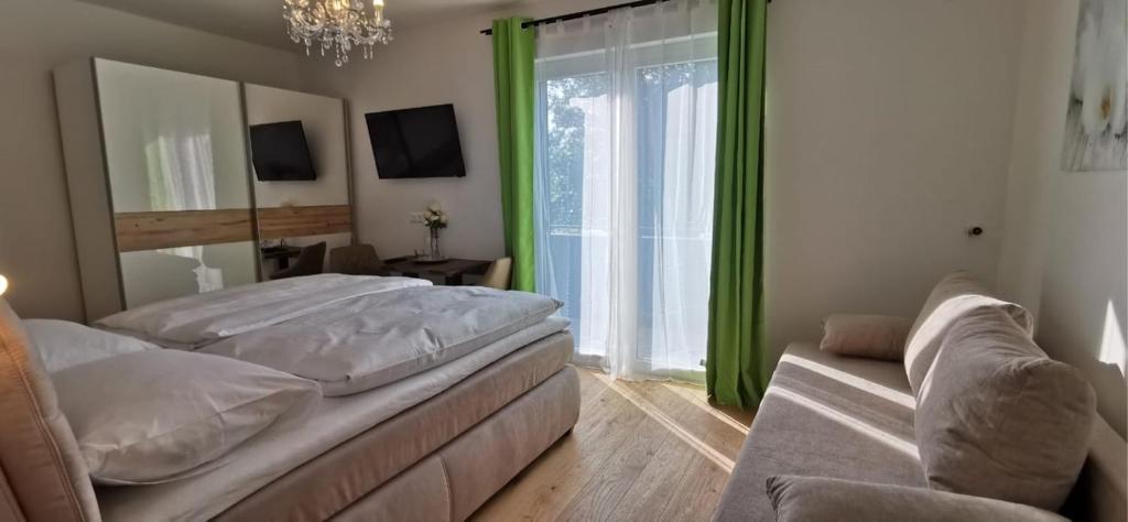 Posteľ alebo postele v izbe v ubytovaní Enjoyit Velden West