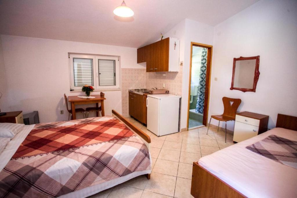 Postel nebo postele na pokoji v ubytování Apartment Vice