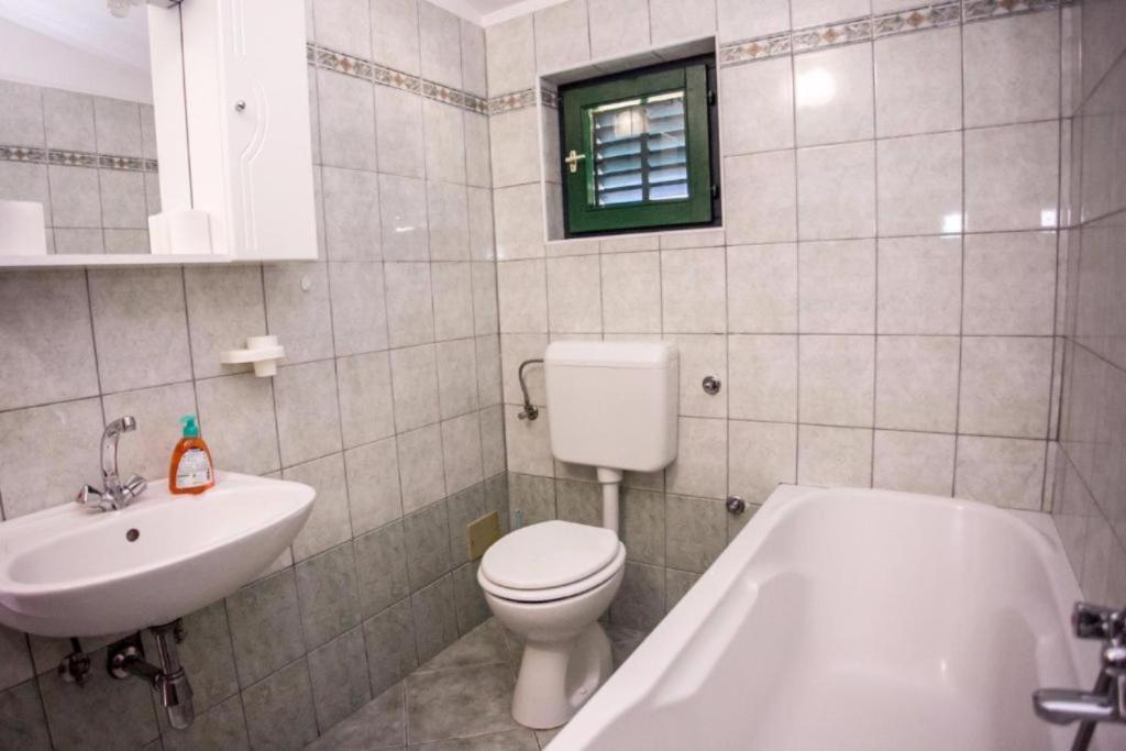 Koupelna v ubytování Apartment Vice