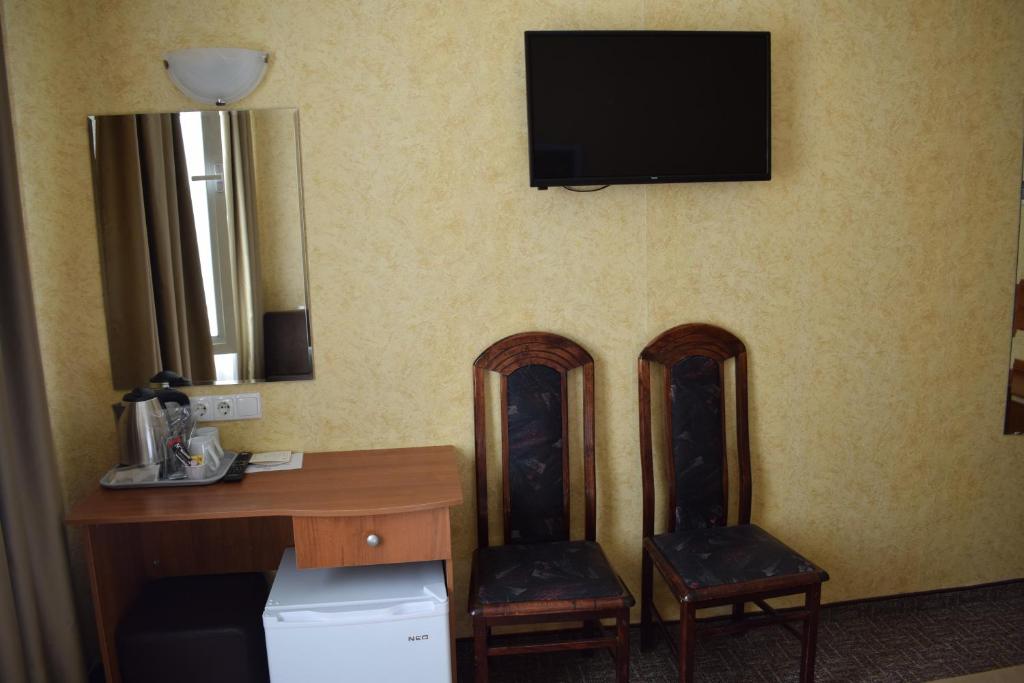 TV a/nebo společenská místnost v ubytování Slavyanska Beseda Hotel