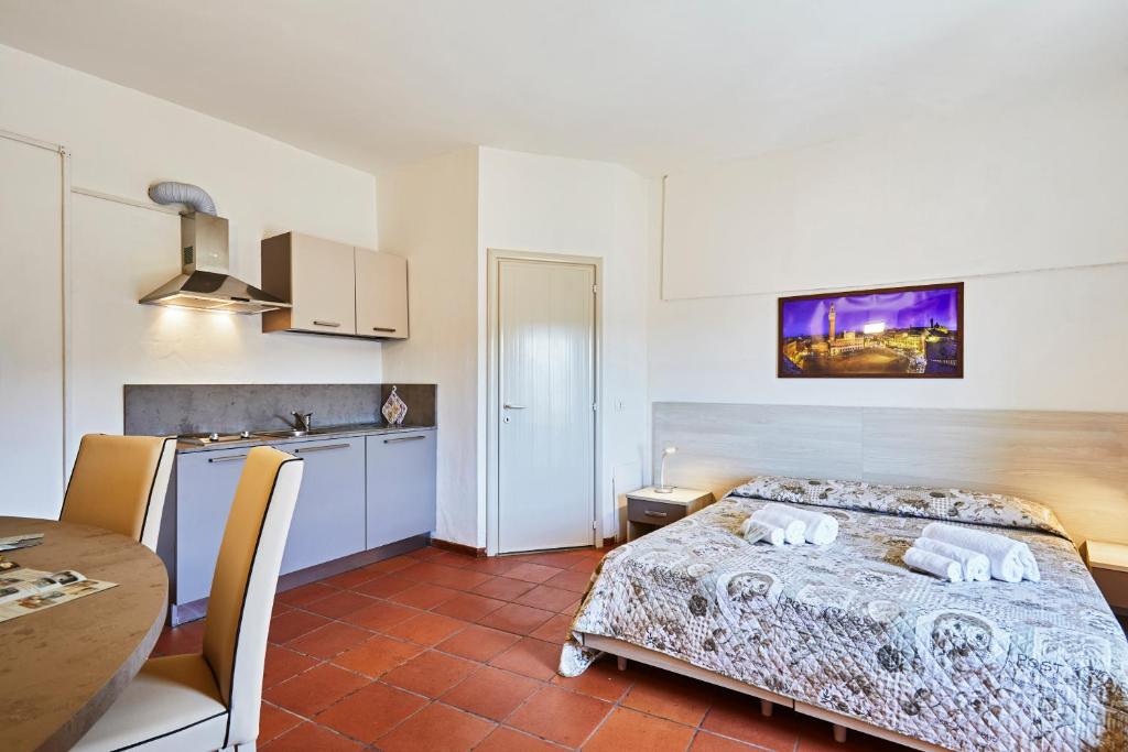 Posteľ alebo postele v izbe v ubytovaní Vacanze In Torre