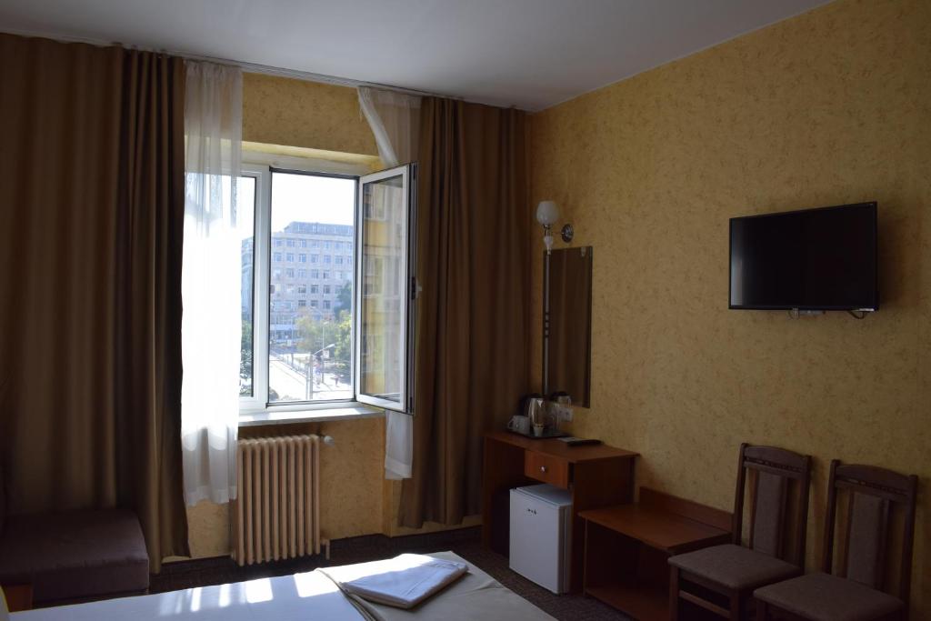 TV a/nebo společenská místnost v ubytování Slavyanska Beseda Hotel
