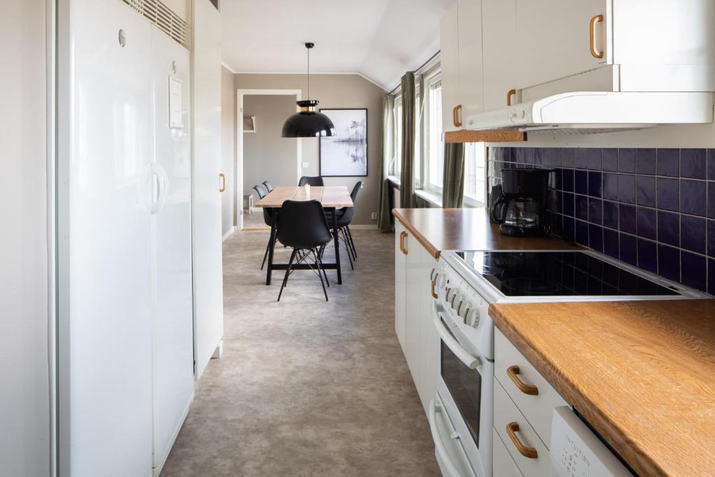 Kuchyň nebo kuchyňský kout v ubytování Hotel B&B Gränden
