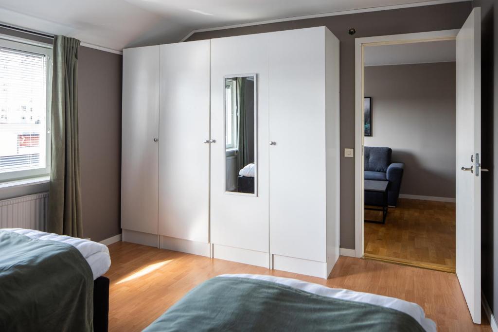 Postel nebo postele na pokoji v ubytování Hotel B&B Gränden