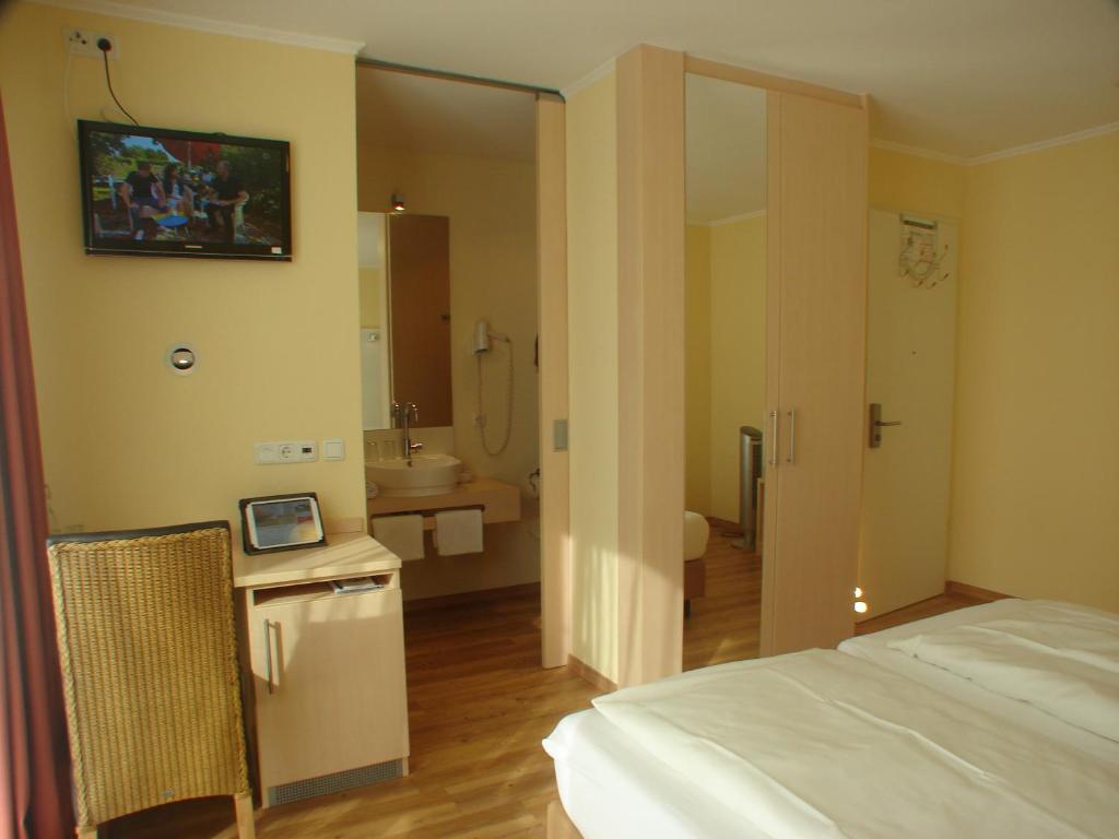 TV a/nebo společenská místnost v ubytování Rotenberg PT Hotel