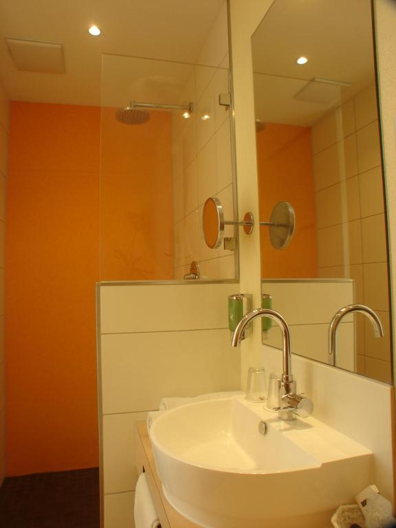 Koupelna v ubytování Rotenberg PT Hotel