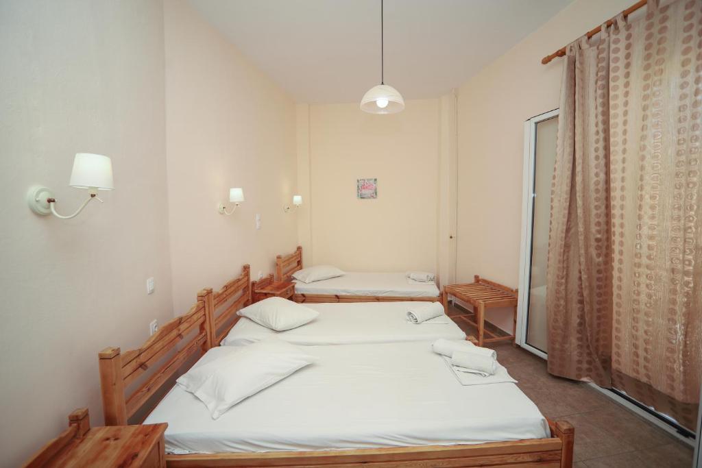 Postel nebo postele na pokoji v ubytování Europe Hotel