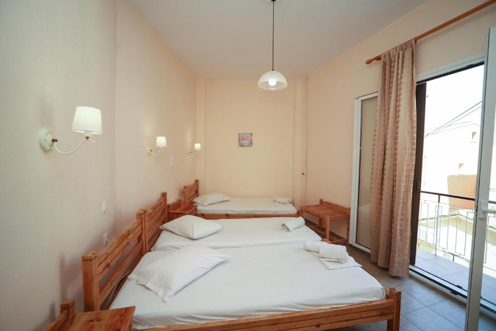 Postel nebo postele na pokoji v ubytování Europe Hotel