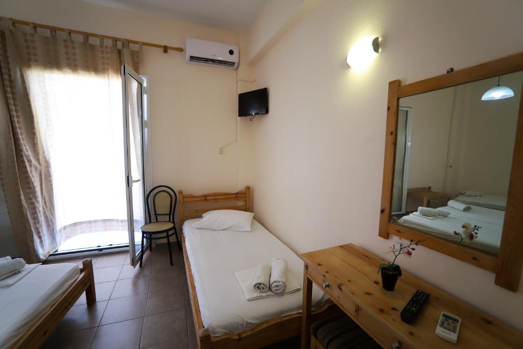 Postel nebo postele na pokoji v ubytování Europe Hotel
