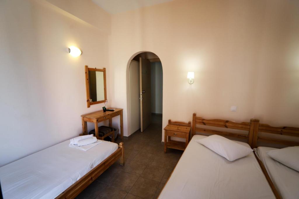 Postel nebo postele na pokoji v ubytování Europe Hotel