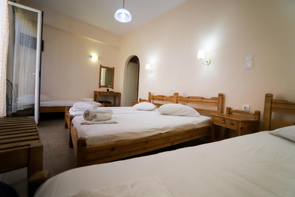 Postel nebo postele na pokoji v ubytování Europe Hotel