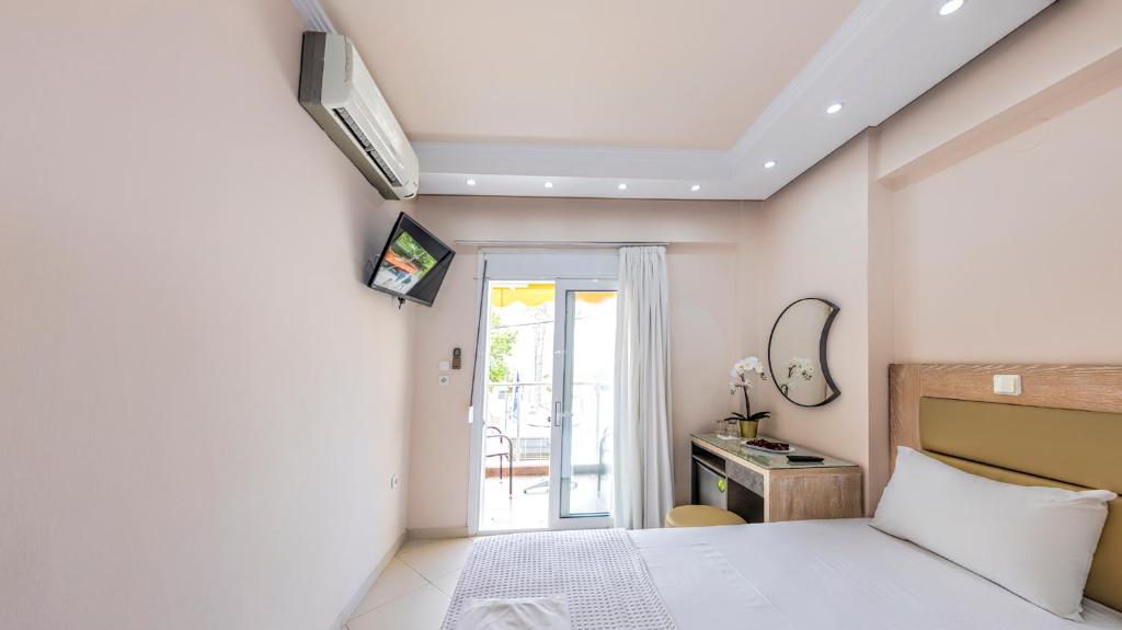 TV a/nebo společenská místnost v ubytování Le Monde SeaView Suites