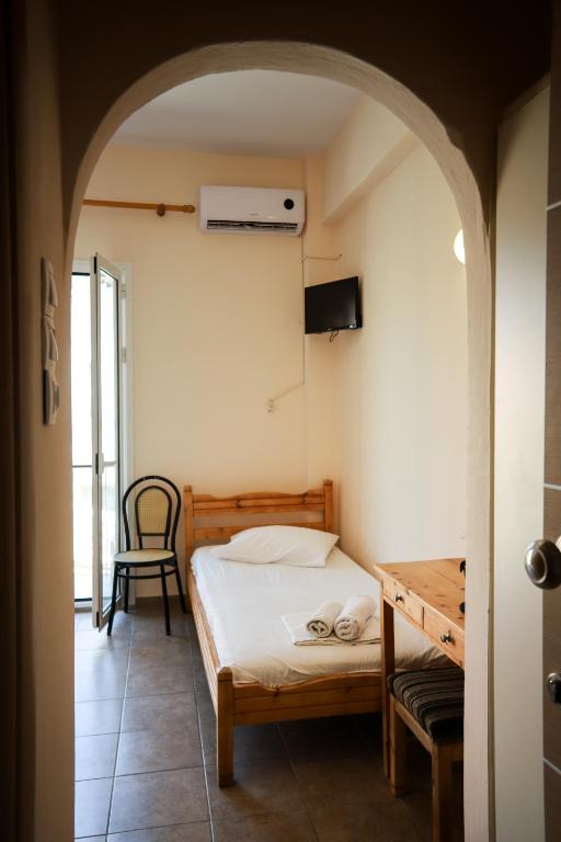 Postel nebo postele na pokoji v ubytování Europe Hotel