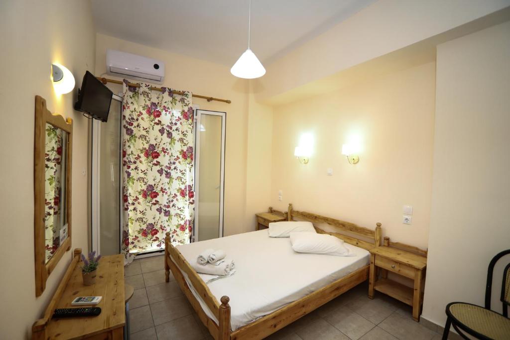 Postel nebo postele na pokoji v ubytování Europe Hotel
