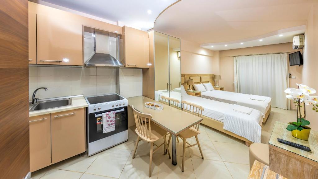 Kuchyň nebo kuchyňský kout v ubytování Le Monde SeaView Suites