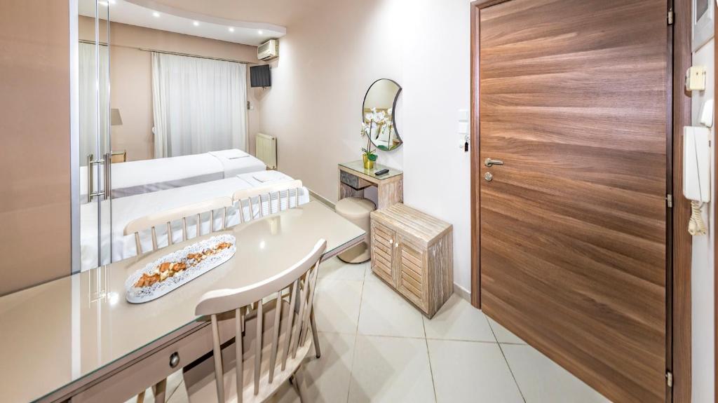 Postel nebo postele na pokoji v ubytování Le Monde SeaView Suites