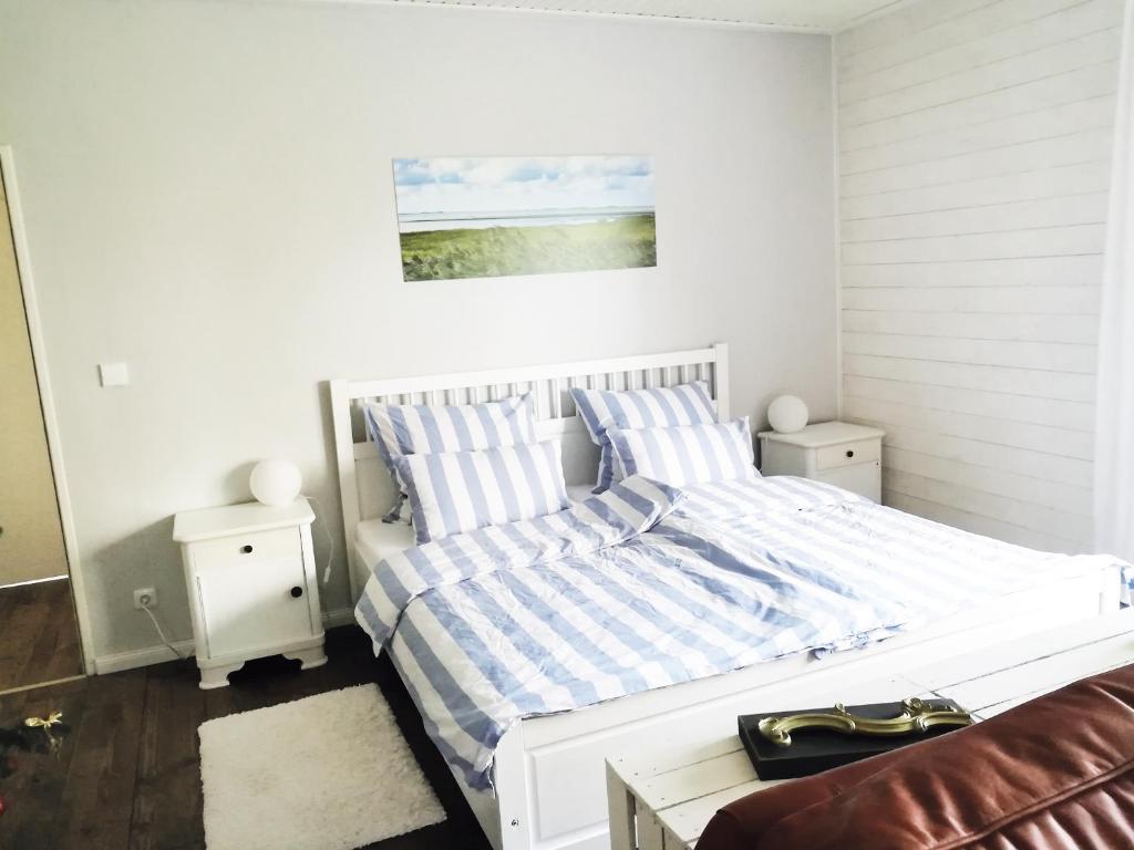 Ένα ή περισσότερα κρεβάτια σε δωμάτιο στο STUDIOAPPARTEMENT KOENIGSACKER