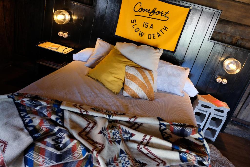 Postel nebo postele na pokoji v ubytování Casa Carmina Hostel