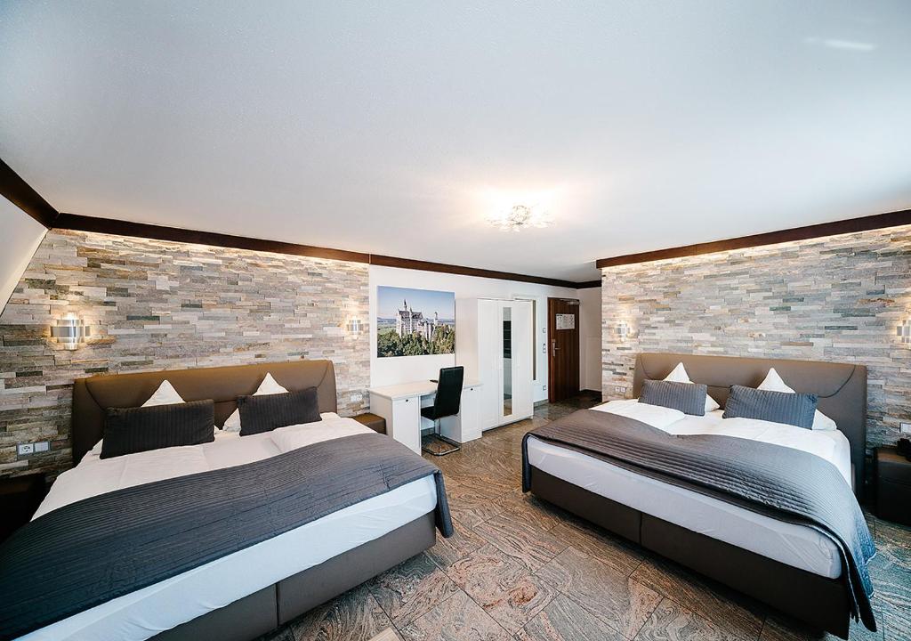 Postel nebo postele na pokoji v ubytování Central City Hotel