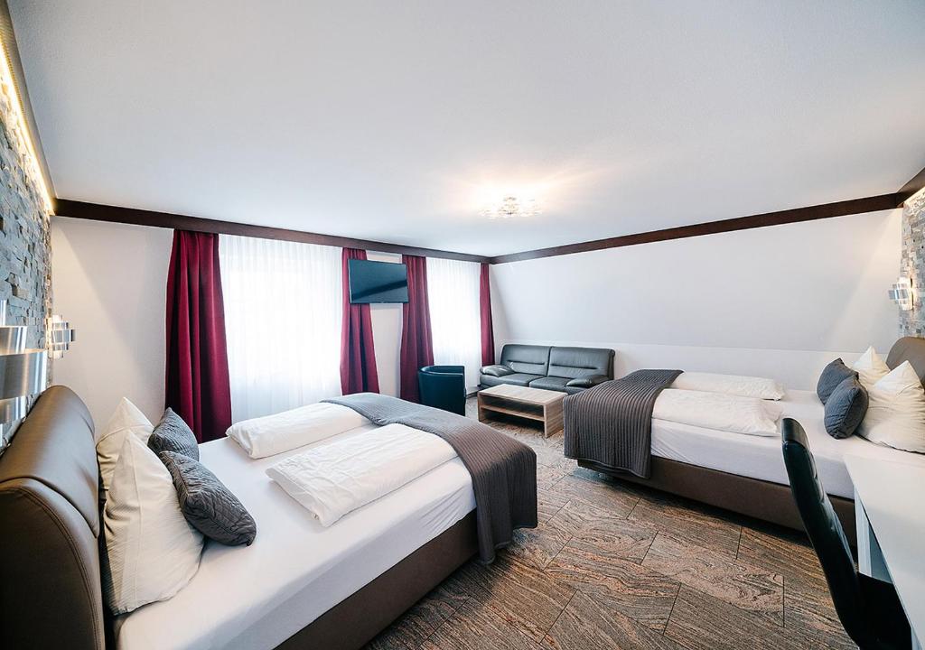 Postel nebo postele na pokoji v ubytování Central City Hotel