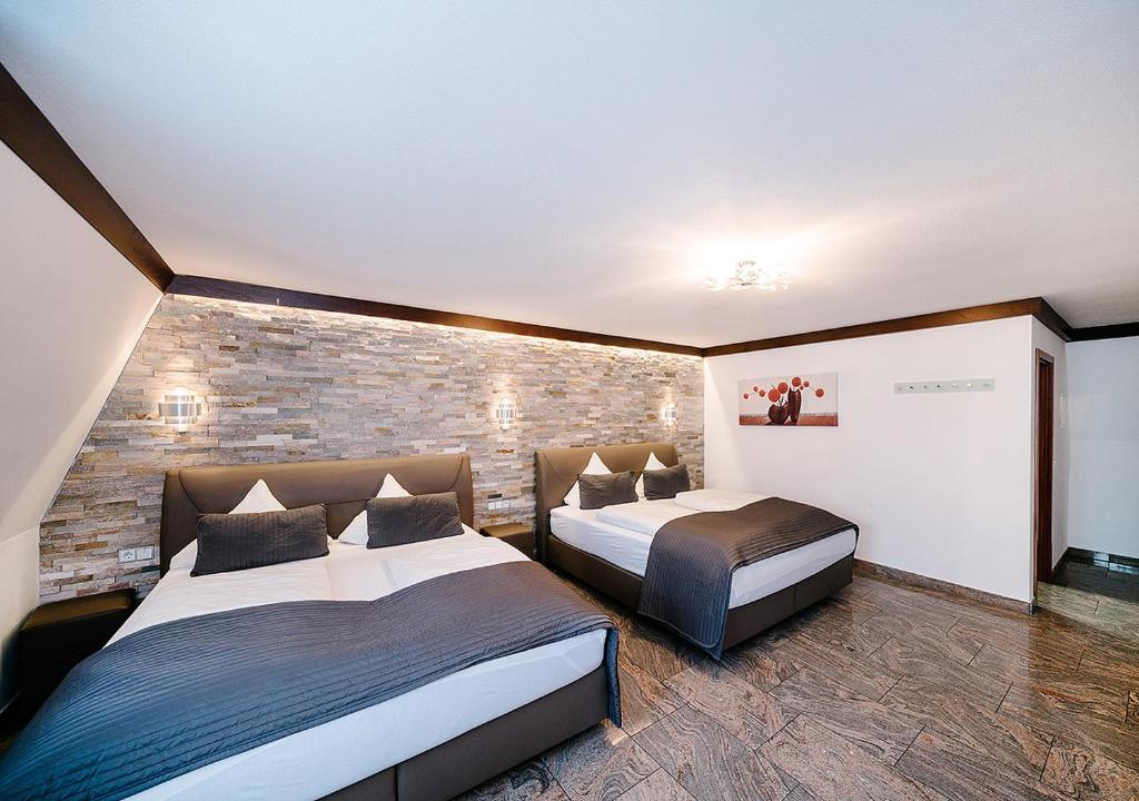 Postel nebo postele na pokoji v ubytování Central City Hotel