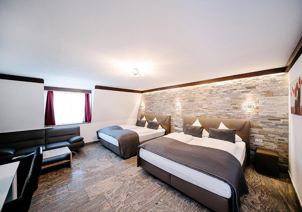 Postel nebo postele na pokoji v ubytování Central City Hotel