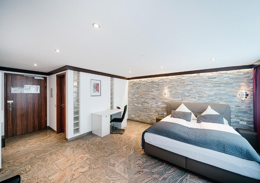 Postel nebo postele na pokoji v ubytování Central City Hotel