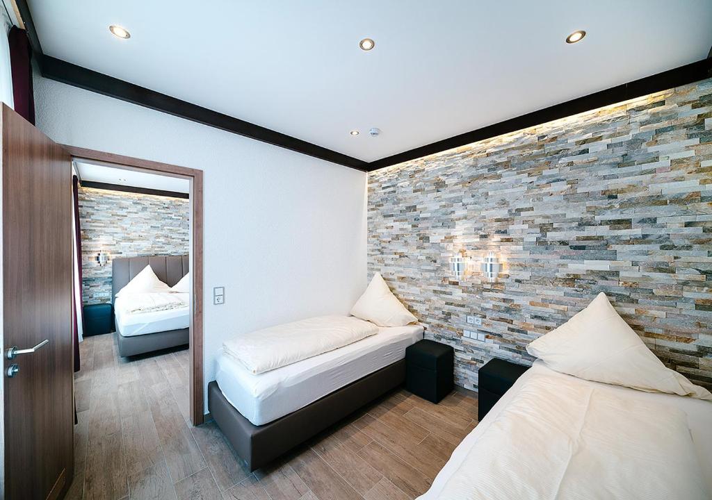Postel nebo postele na pokoji v ubytování Central City Hotel