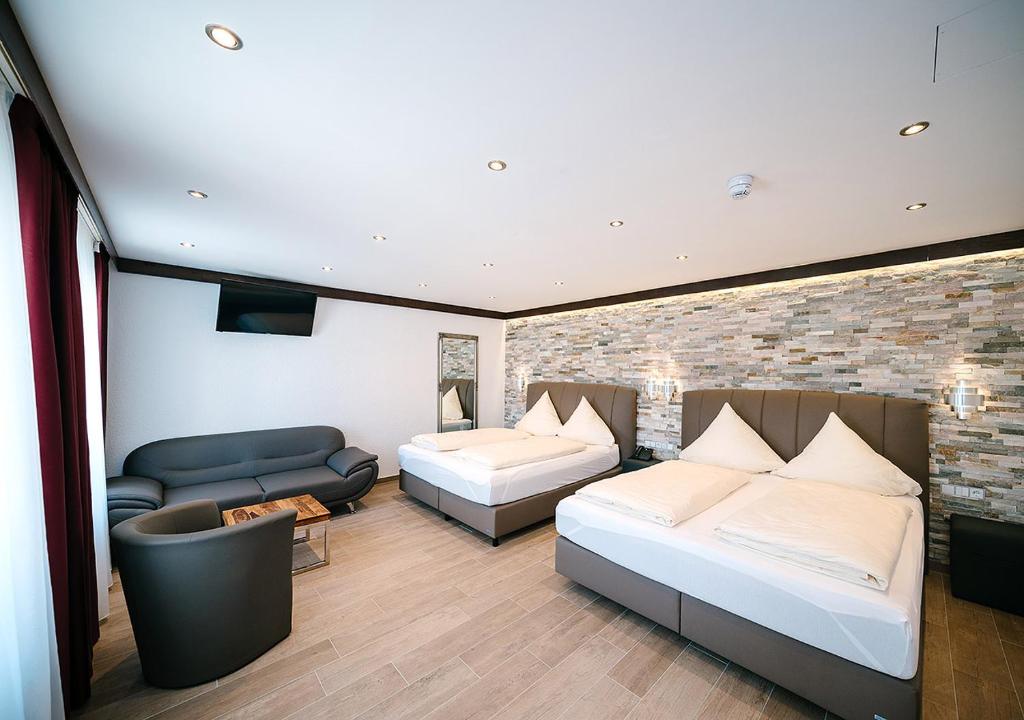 Postel nebo postele na pokoji v ubytování Central City Hotel