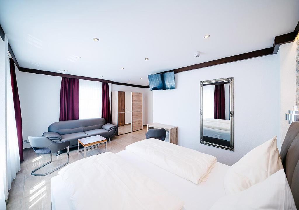 Postel nebo postele na pokoji v ubytování Central City Hotel