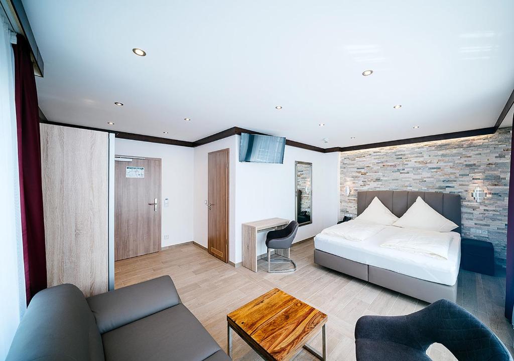 Postel nebo postele na pokoji v ubytování Central City Hotel