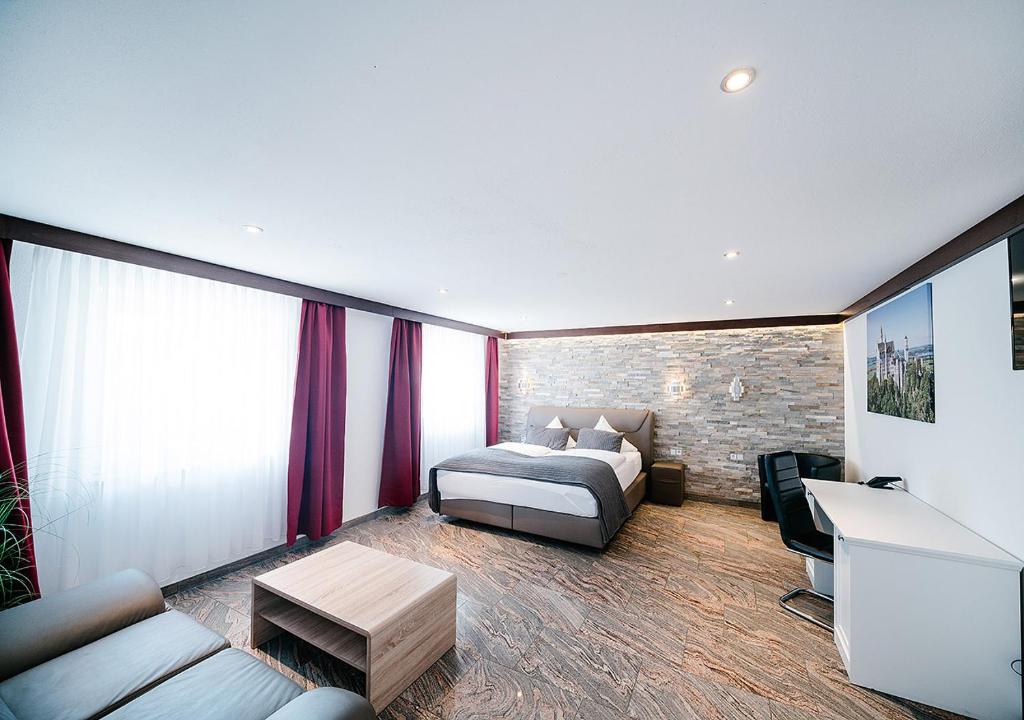 Postel nebo postele na pokoji v ubytování Central City Hotel