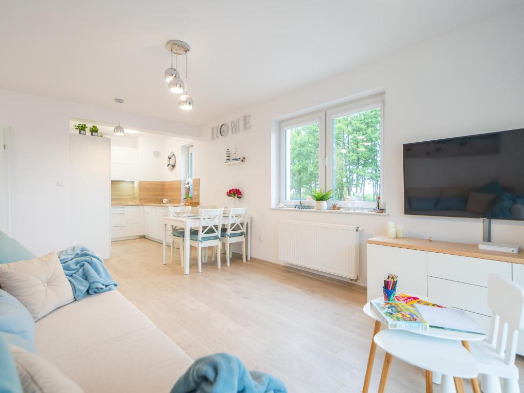 Televízia a/alebo spoločenská miestnosť v ubytovaní Apartament Happy Time SPA - Kołobrzeg