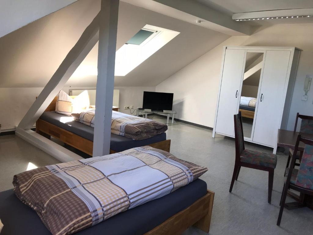 Postel nebo postele na pokoji v ubytování Gästehaus Sandra