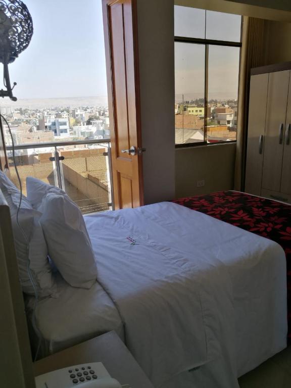 Postel nebo postele na pokoji v ubytování Hotel Spa Machupicchu