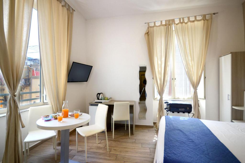 Posteľ alebo postele v izbe v ubytovaní B&B Funikuli Funikula