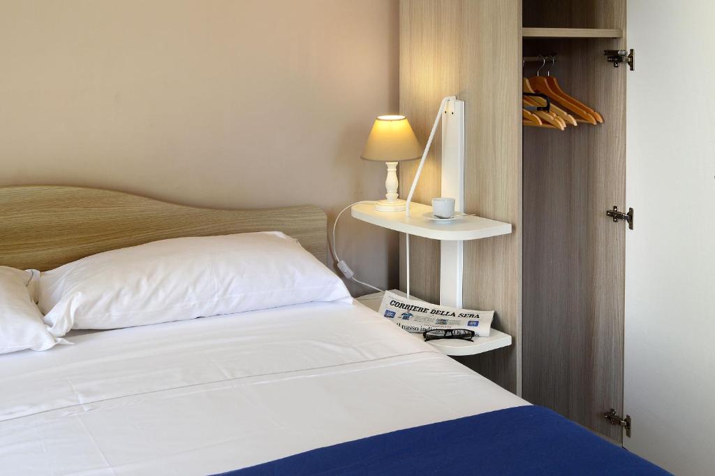 Posteľ alebo postele v izbe v ubytovaní B&B Funikuli Funikula