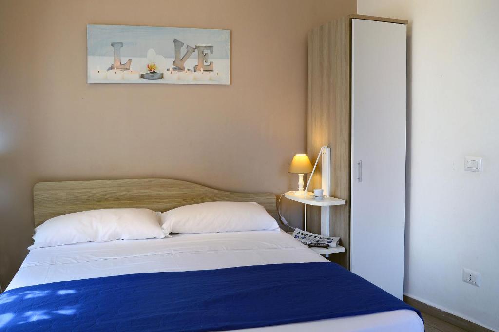 Posteľ alebo postele v izbe v ubytovaní B&B Funikuli Funikula