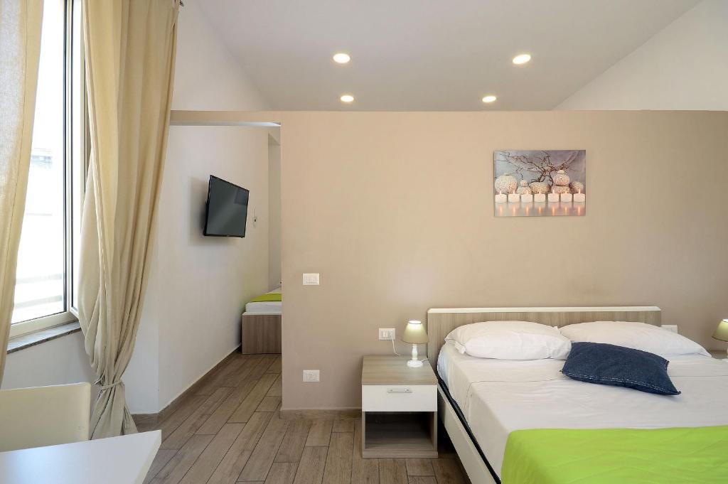 Posteľ alebo postele v izbe v ubytovaní B&B Funikuli Funikula