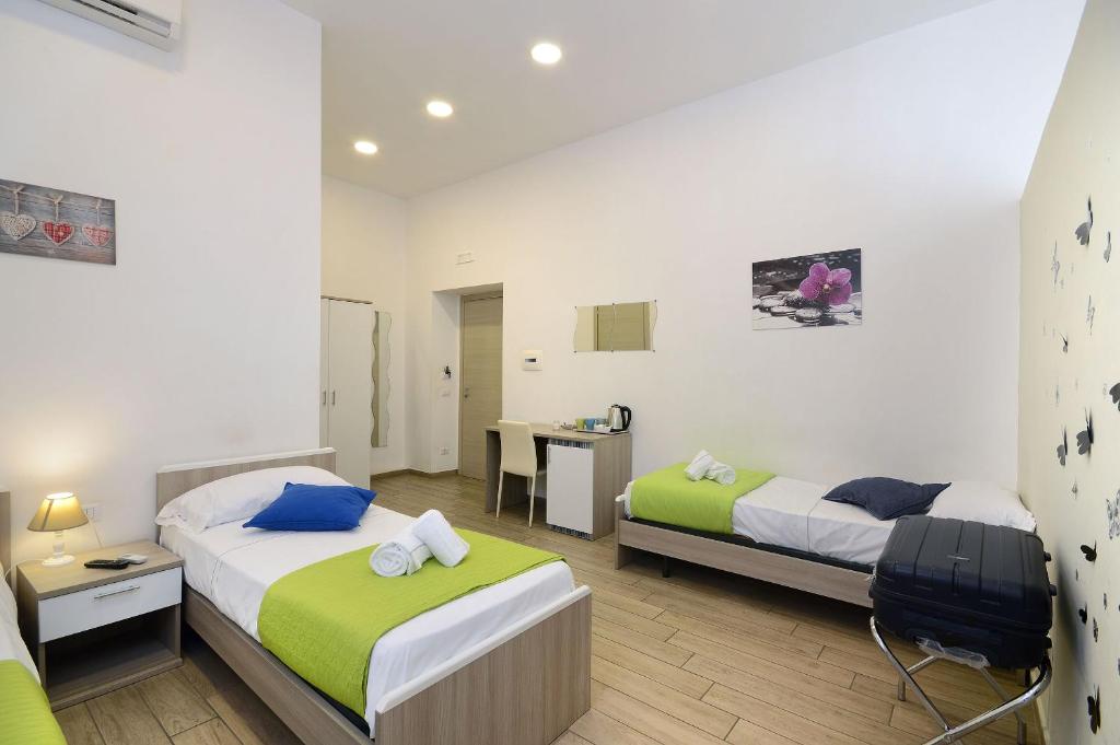 Posteľ alebo postele v izbe v ubytovaní B&B Funikuli Funikula