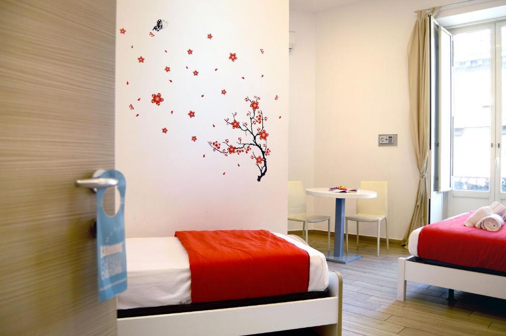 Posteľ alebo postele v izbe v ubytovaní B&B Funikuli Funikula