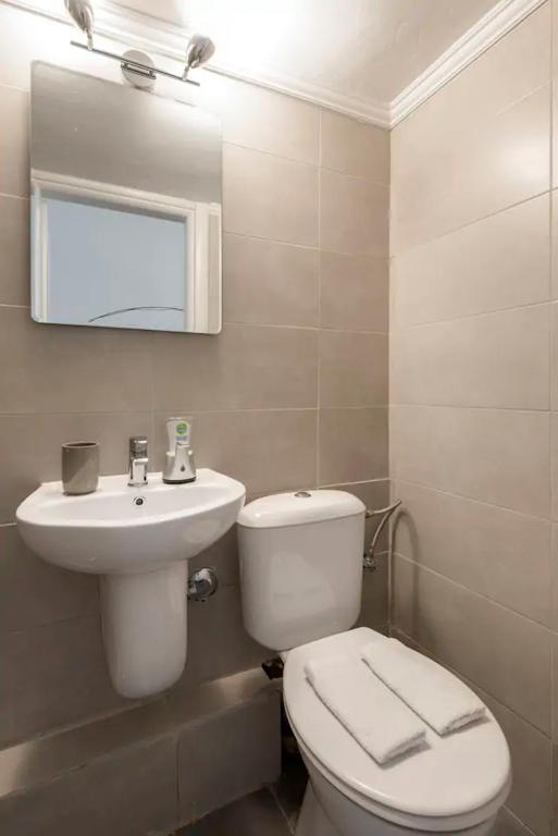 Kúpeľňa v ubytovaní Aristotelous Square Luxury Studio