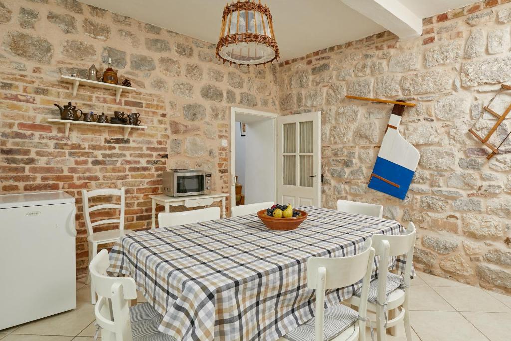 Kuchyň nebo kuchyňský kout v ubytování Mediterranean Holiday House & Apartments