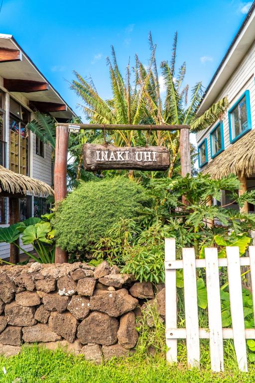 a sign that saysmark out in front of a house at Inaki Uhi Hotel in Hanga Roa