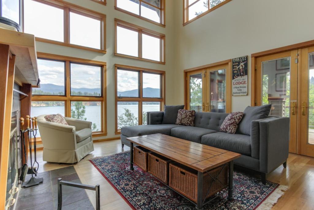 a living room with a couch and a coffee table at Starling Lake House in Hayden