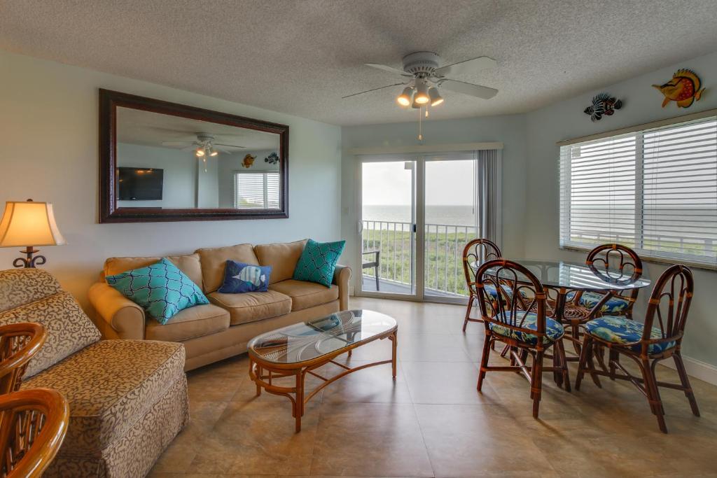 a living room with a couch and a table at Oceanside Retreat in Tavernier